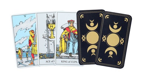 Tarot cards on white background, top view
