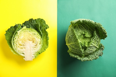 Fresh savoy cabbages on color background, flat lay