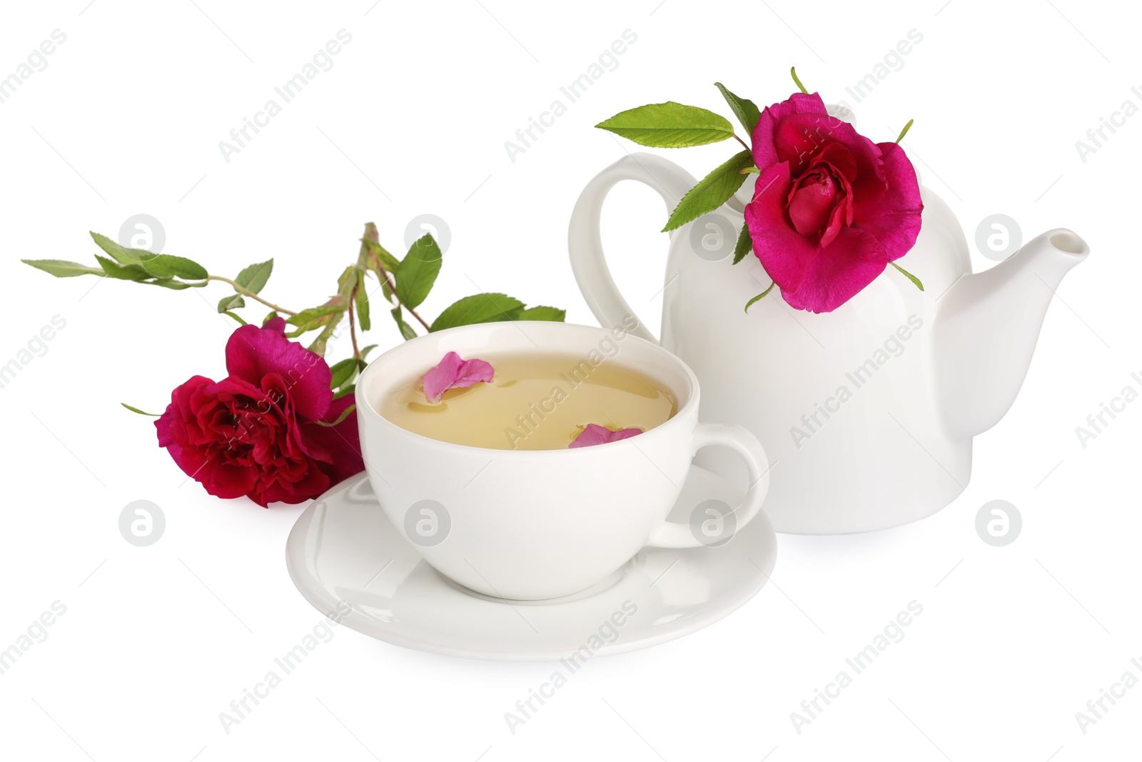 Photo of Aromatic herbal tea with rose flowers isolated on white