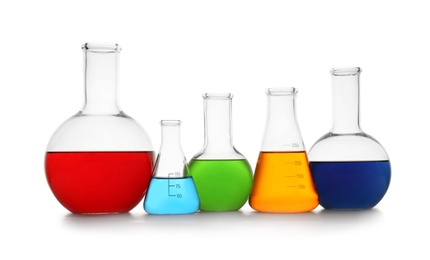 Photo of Chemistry glassware with color samples isolated on white