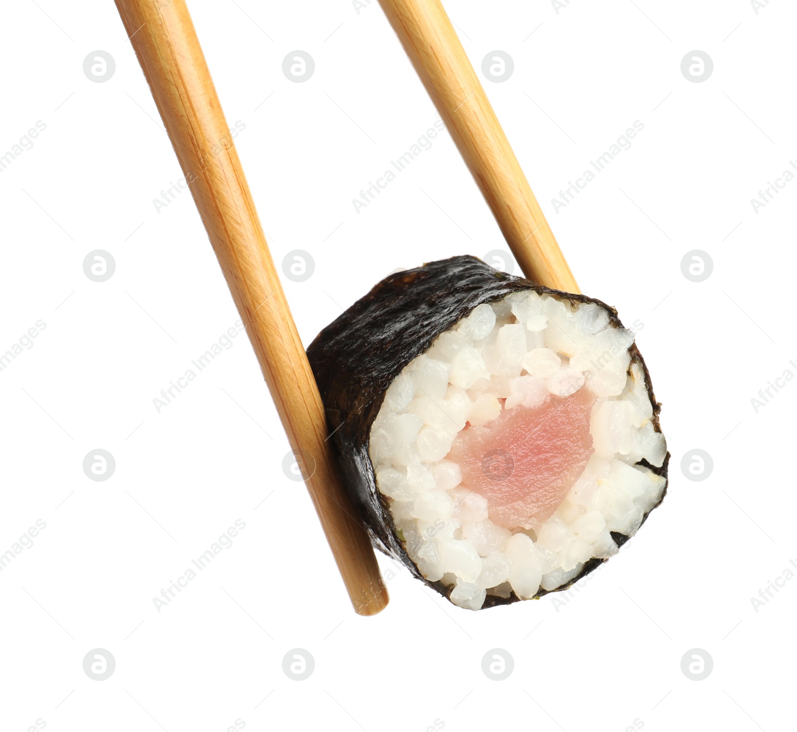 Photo of Chopsticks with tasty fresh sushi roll isolated on white