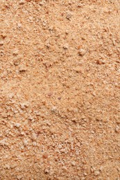 Pile of fresh bread crumbs as background, top view
