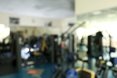Blurred view of gym with modern equipment