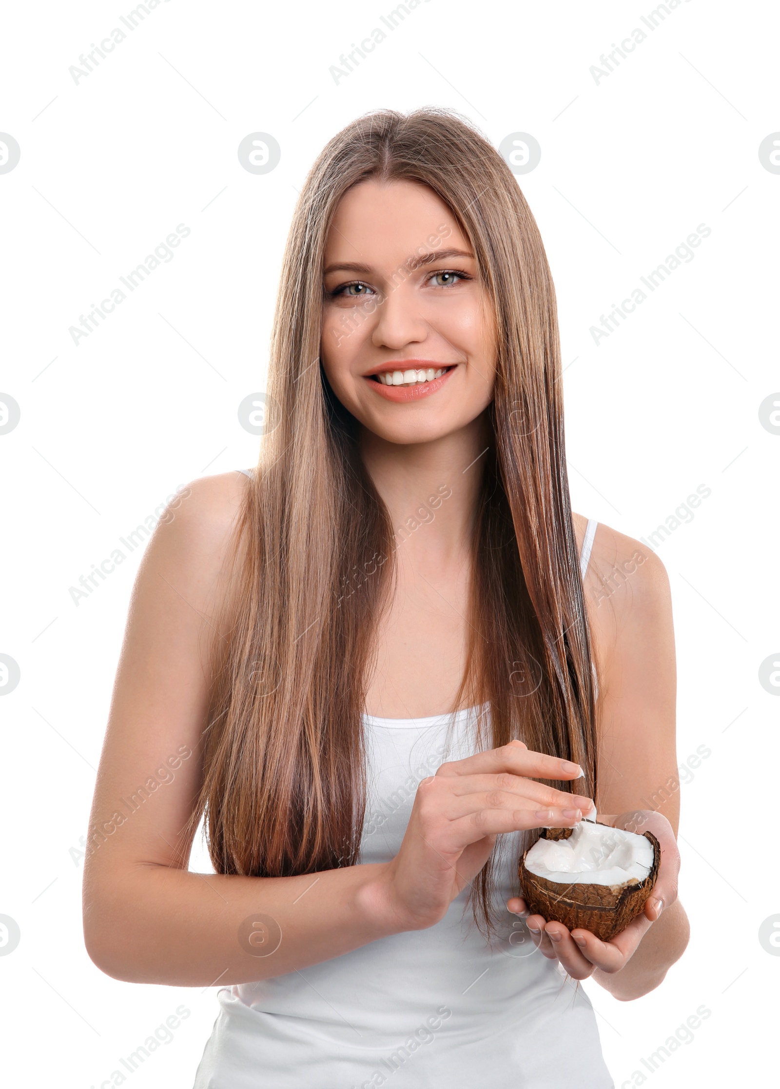 Photo of Young woman with coconut oil for hair on white background