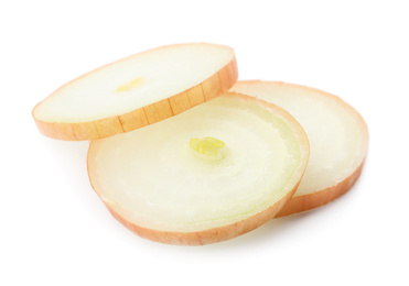 Photo of Slices of raw yellow onion on white background