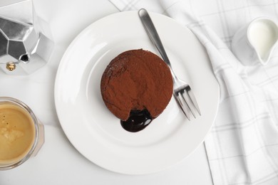 Photo of Delicious fresh fondant with hot chocolate served on white table, flat lay