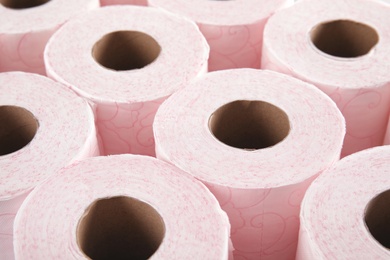 Photo of Many rolls of toilet paper as background