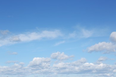 Photo of Picturesque blue sky with white clouds on sunny day
