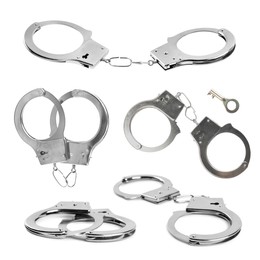 Image of Set with classic chain handcuffs on white background