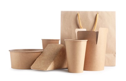 Photo of Eco friendly packaging. Disposable food containers and paper bag isolated on white