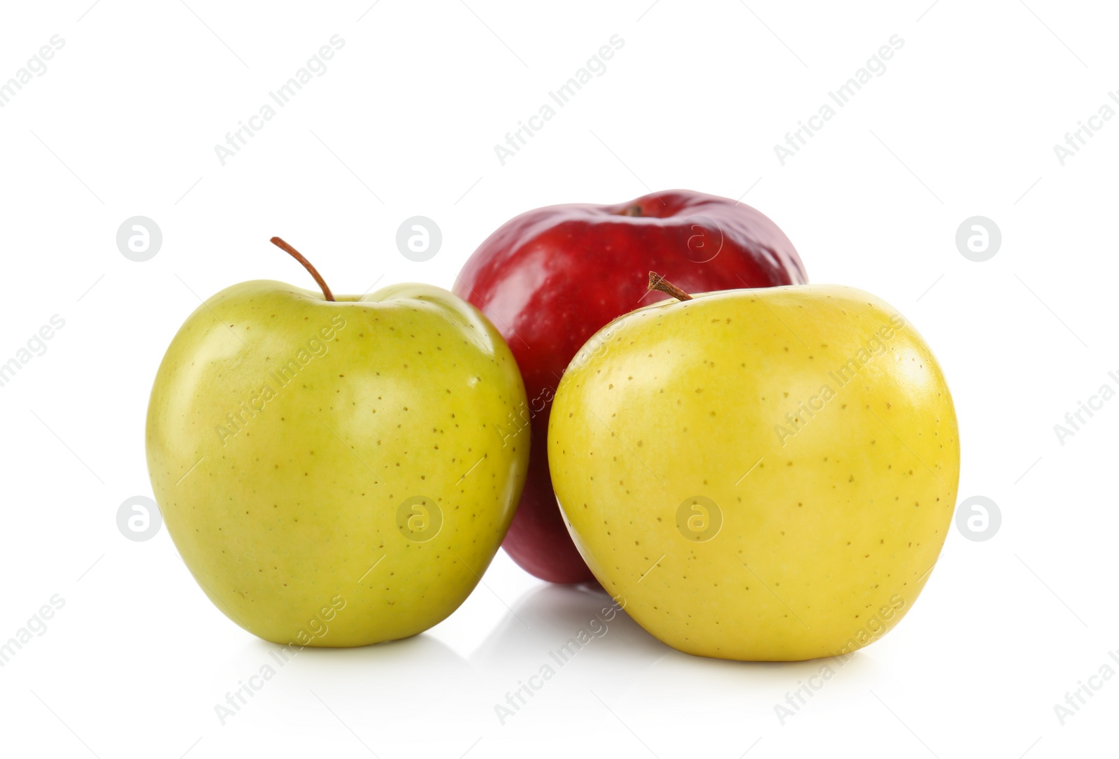 Photo of Fresh juicy yellow and red apples on white background