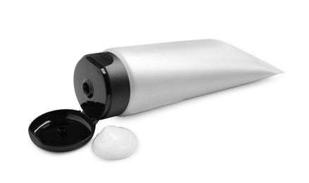 Photo of Open tube with men's facial cream on white background