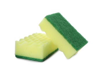 Photo of Yellow cleaning sponge with abrasive green scourers on white background