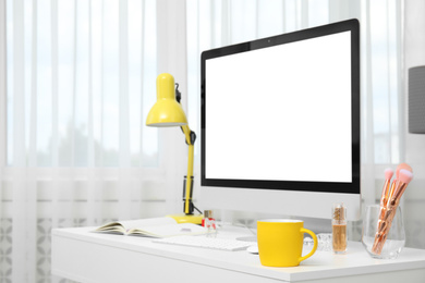 Comfortable workplace with modern computer on table