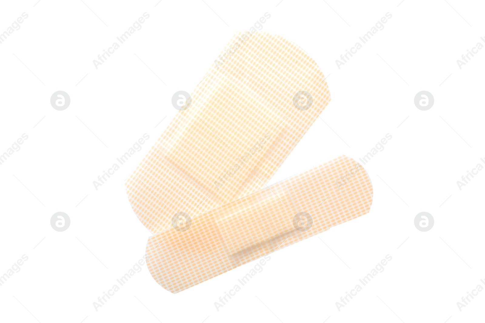 Medical sticking plasters isolated on white. First aid item Photo of Medical sticking plasters isolated on white. First aid item