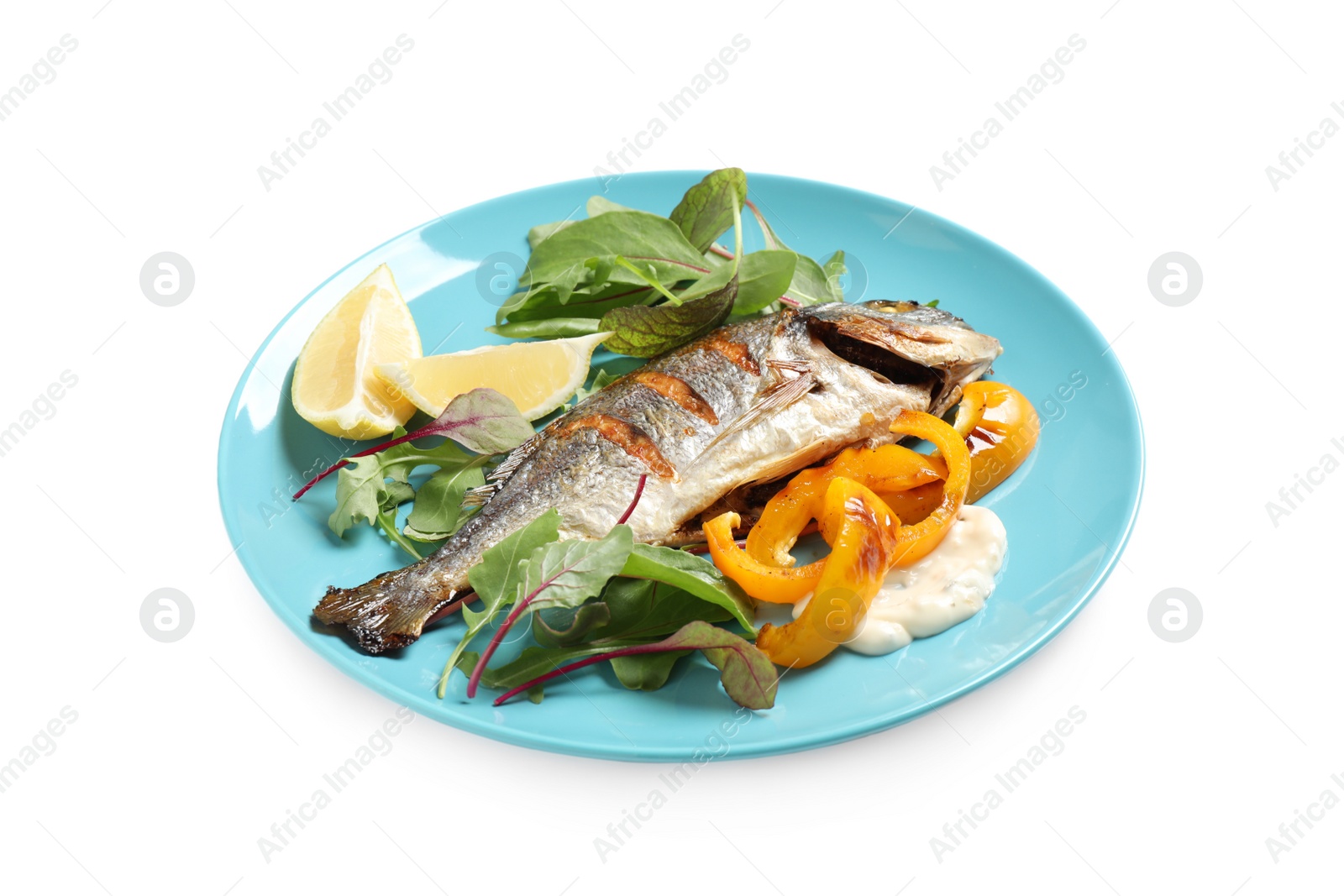 Photo of Delicious roasted fish with lemon and vegetables isolated on white