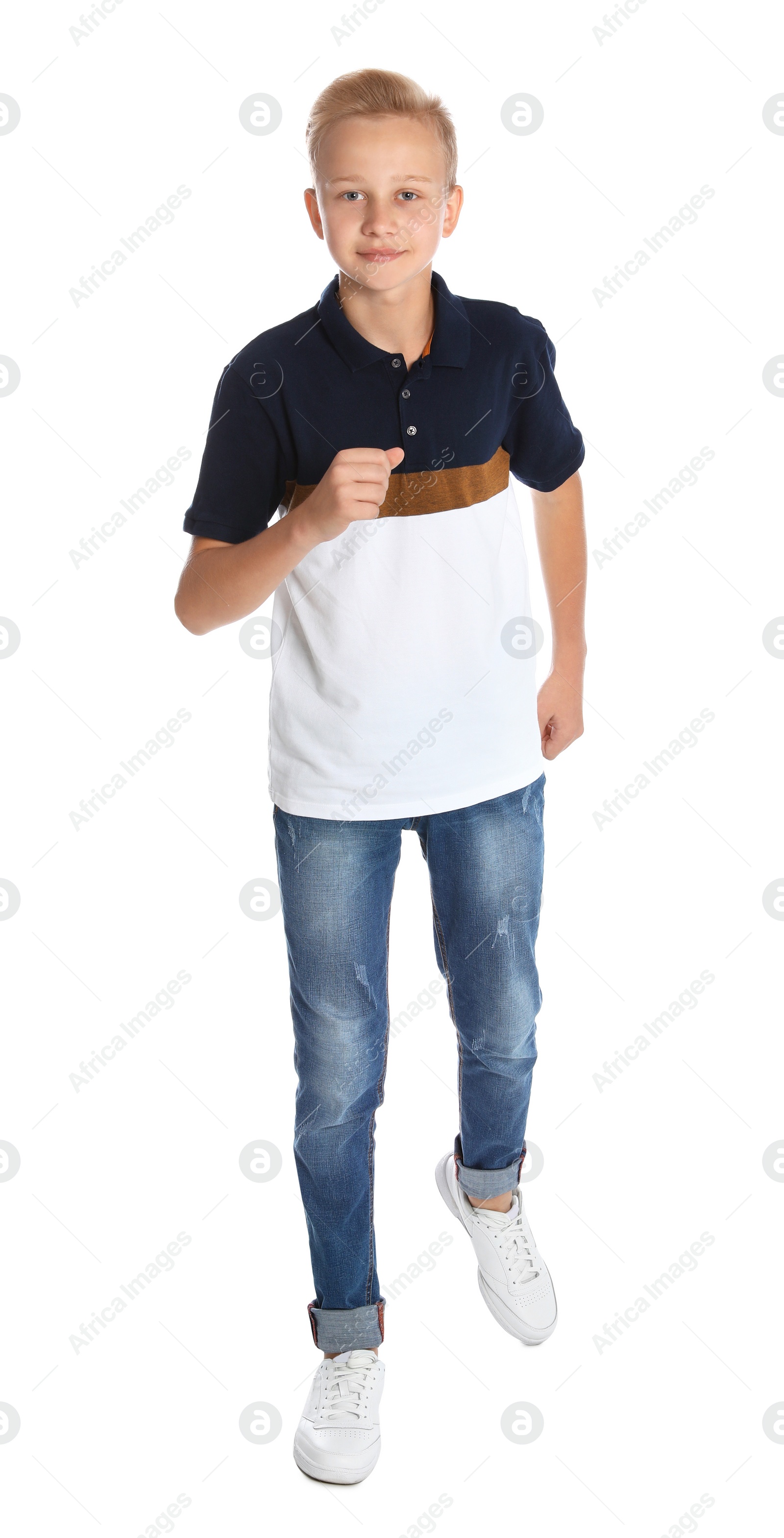 Photo of Full length portrait of teenage boy on white background