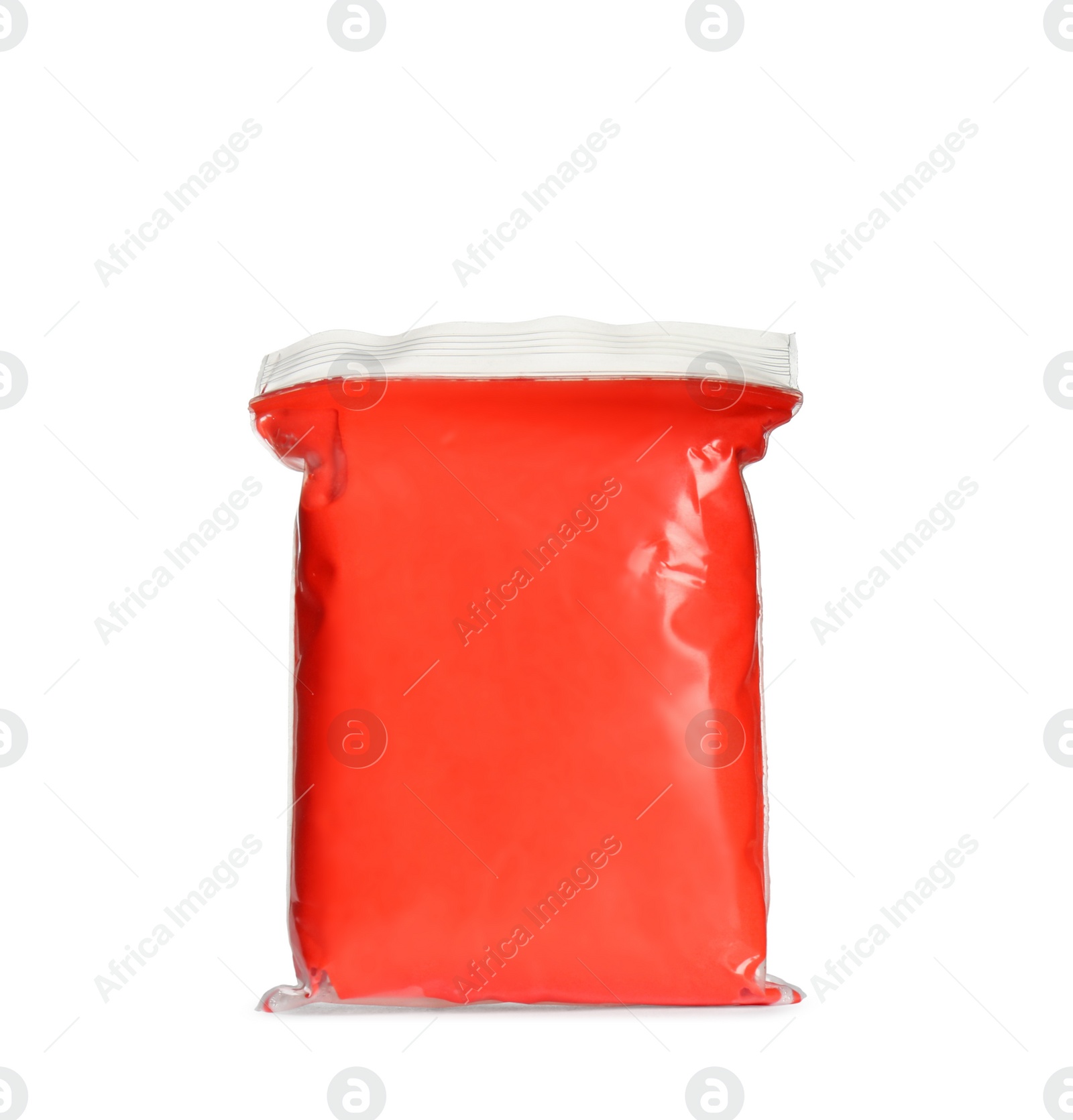 Photo of Package of red play dough isolated on white
