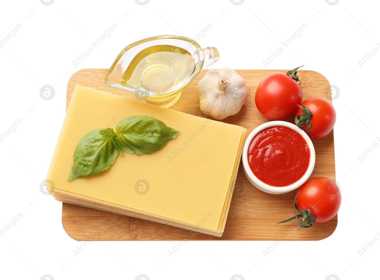 Photo of Uncooked ingredients for lasagna isolated on white, top view