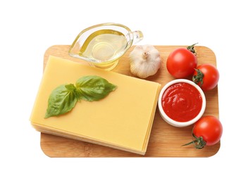 Photo of Uncooked ingredients for lasagna isolated on white, top view