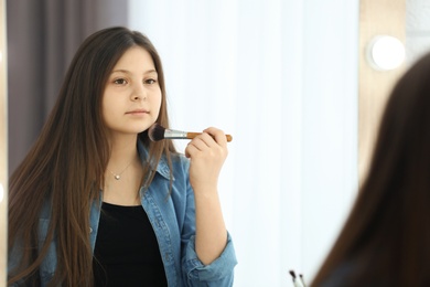 Photo of Attractive teenage girl in dressing room