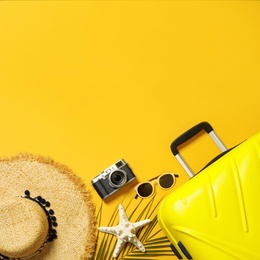 Photo of Flat lay composition with beach accessories on color background. Space for text