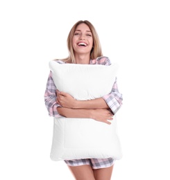 Photo of Young woman in pajamas embracing pillow on white background