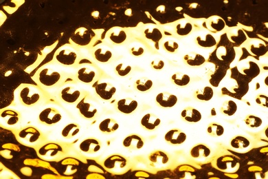 Closeup view of shiny golden surface as background