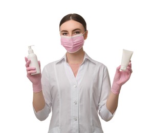 Cosmetologist with cosmetic products on white background
