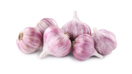 Photo of Pile of fresh raw garlic heads isolated on white