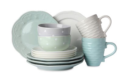 Photo of Set of beautiful ceramic dishware isolated on white