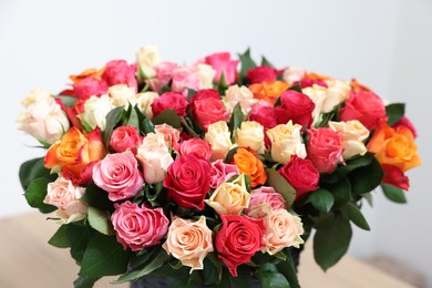 Photo of Bouquet of beautiful roses on light background