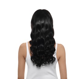 Photo of Young woman with long curly hair on white background, back view