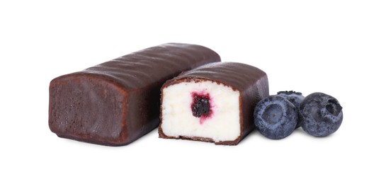 Cut and whole glazed curds with blueberry filling isolated on white