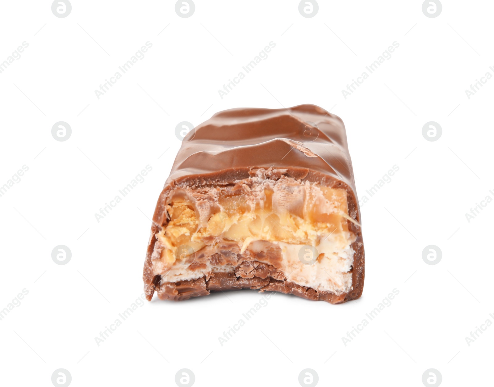 Photo of Piece of chocolate bar with caramel, nuts and nougat isolated on white