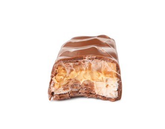 Photo of Piece of chocolate bar with caramel, nuts and nougat isolated on white