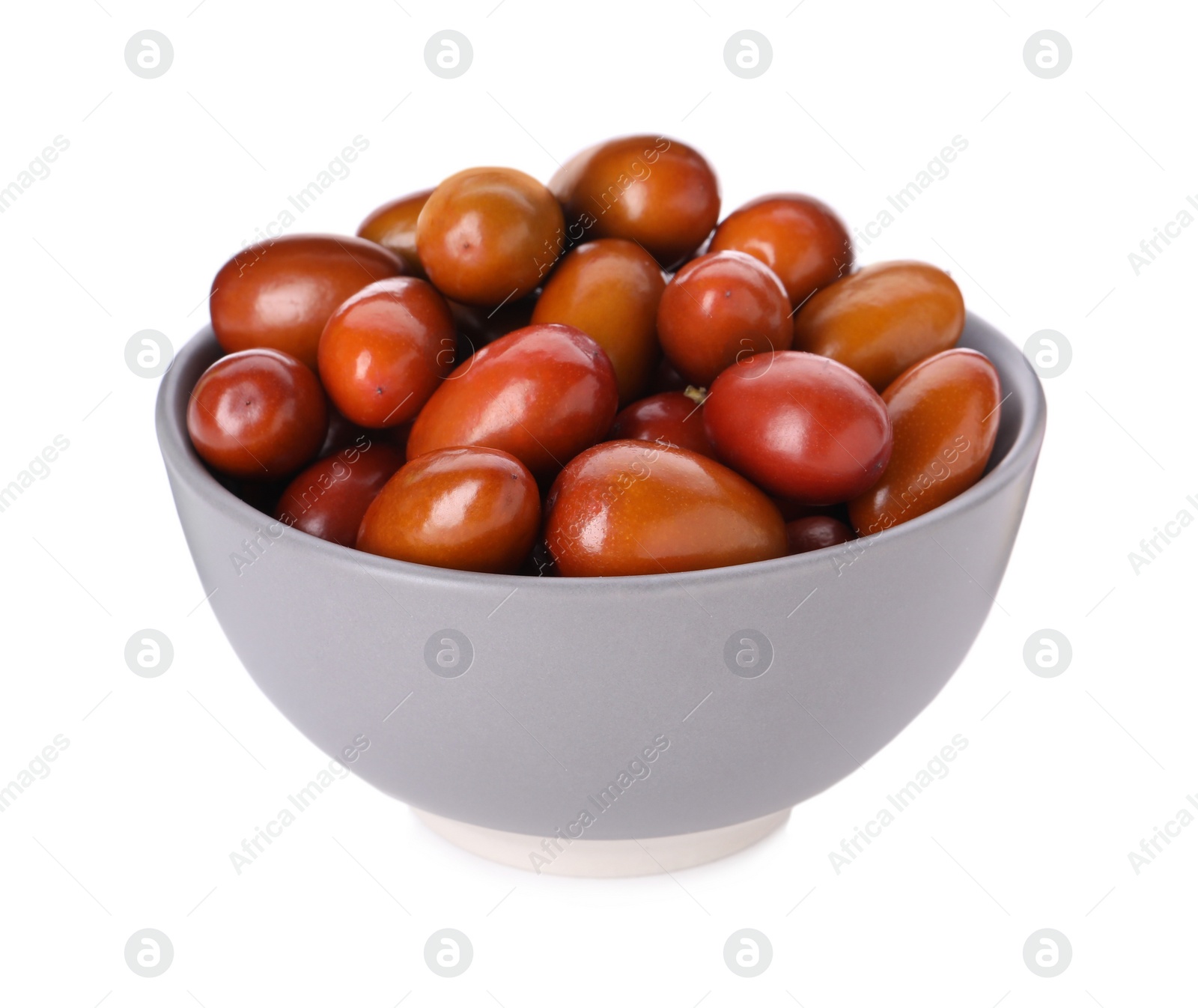 Photo of Ripe red dates in bowl on white background