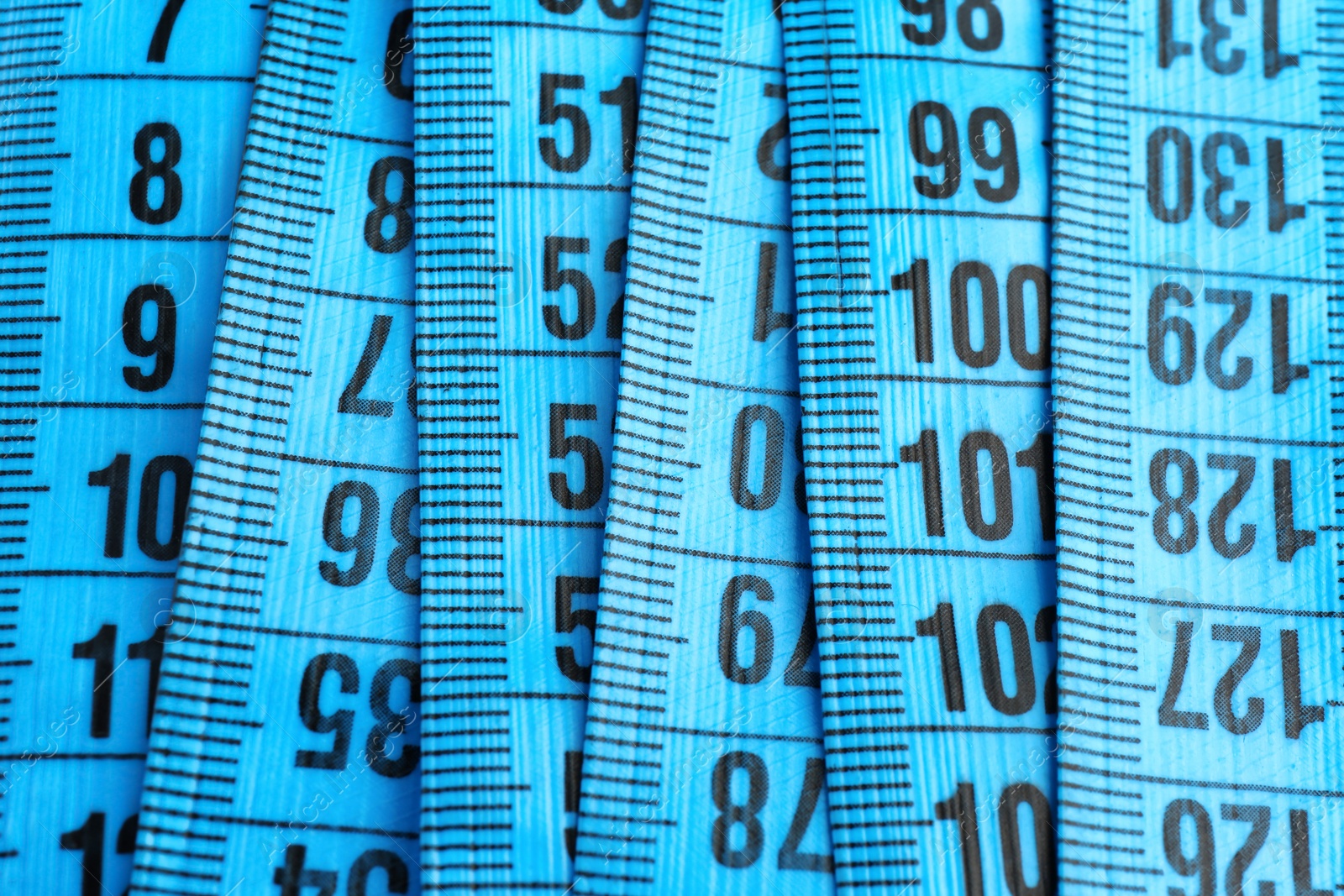 Photo of Different measuring tapes, closeup