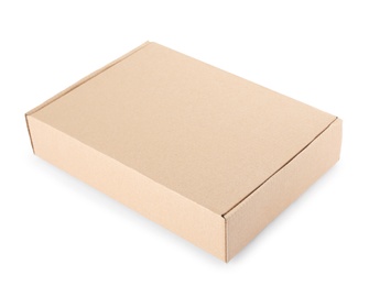 Photo of Closed cardboard box on white background. Mockup for design