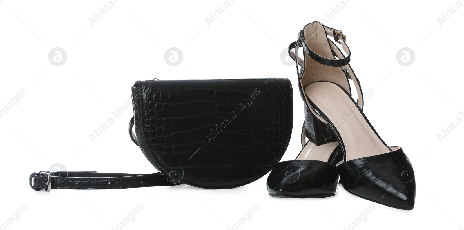 Photo of Stylish woman's bag and shoes isolated on white