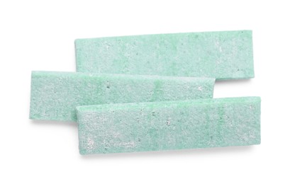 Photo of Sticks of tasty chewing gum isolated on white, top view