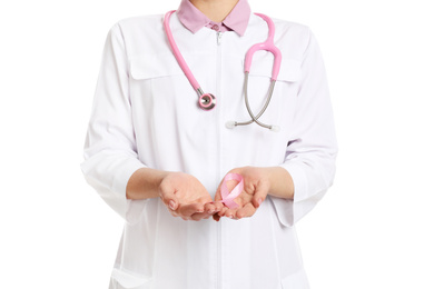 Doctor with pink ribbon and stethoscope on white background, closeup. Breast cancer awareness