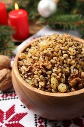 Photo of Traditional Christmas slavic dish kutia in bowl, closeup