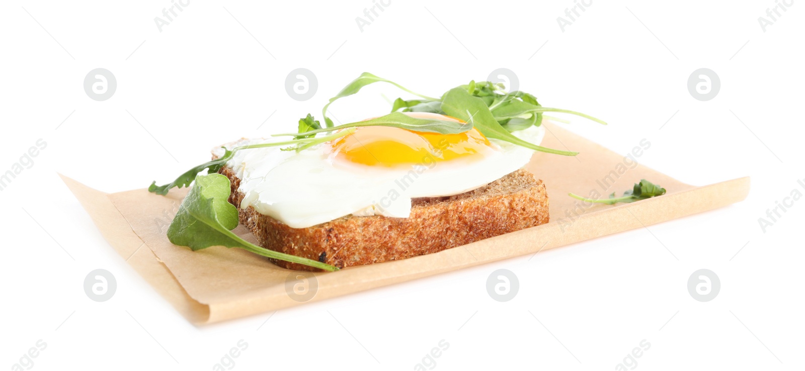 Photo of Delicious sandwich with arugula and fried egg isolated on white