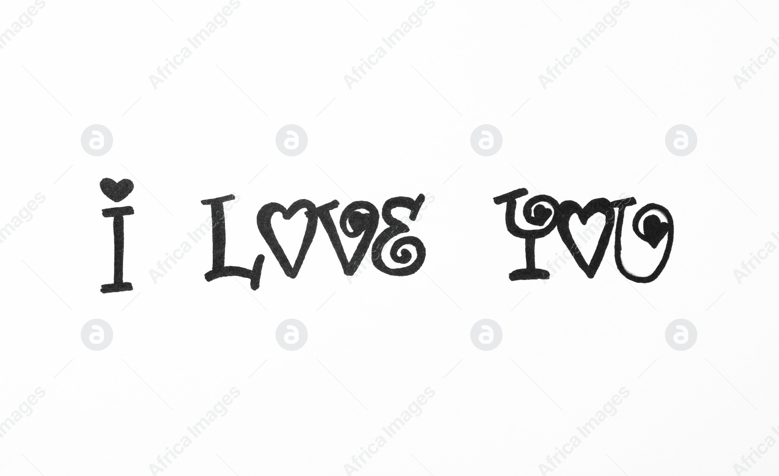 Photo of Handwritten text I Love You on white background