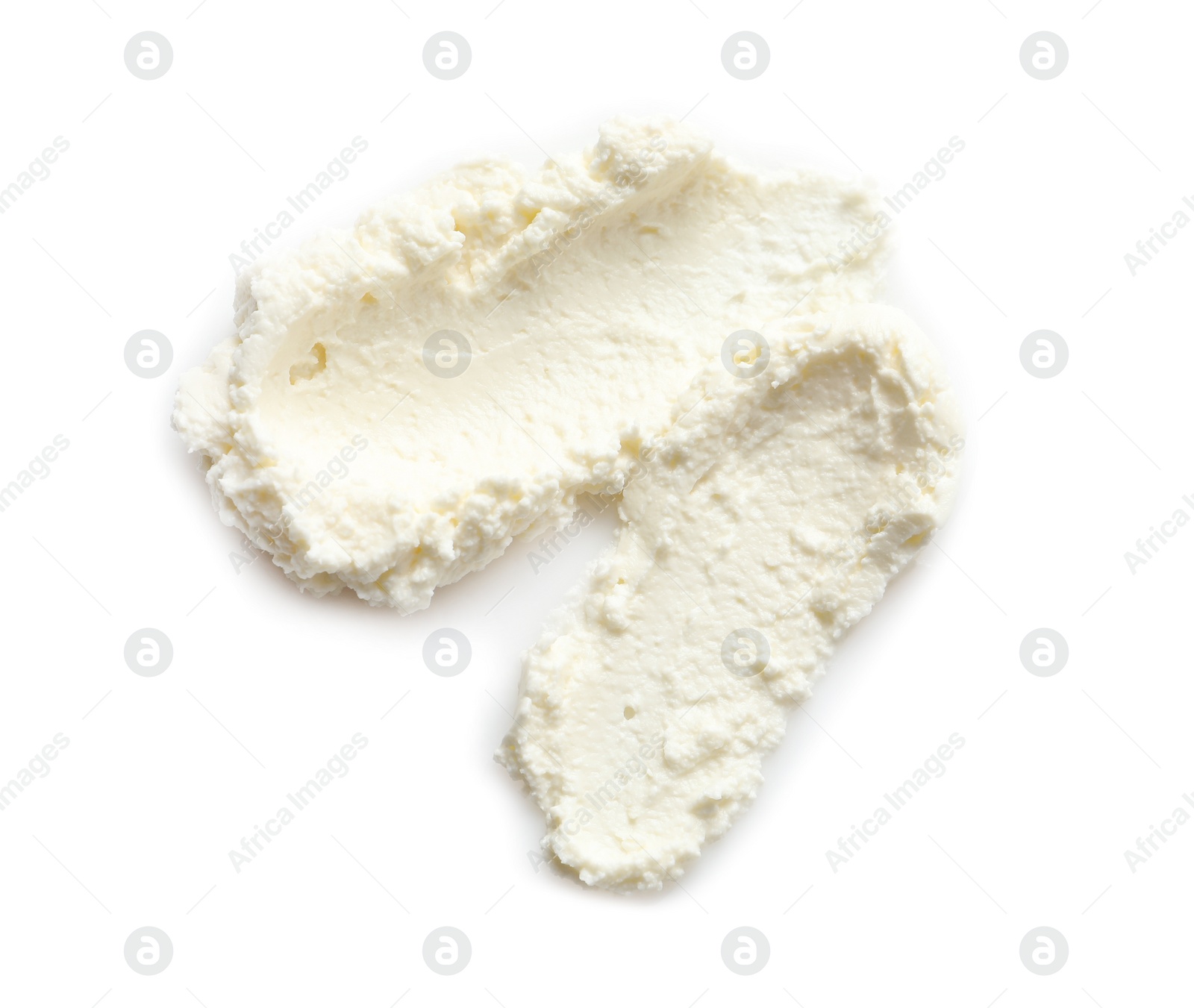 Photo of Smears of tasty cream cheese on white background, top view