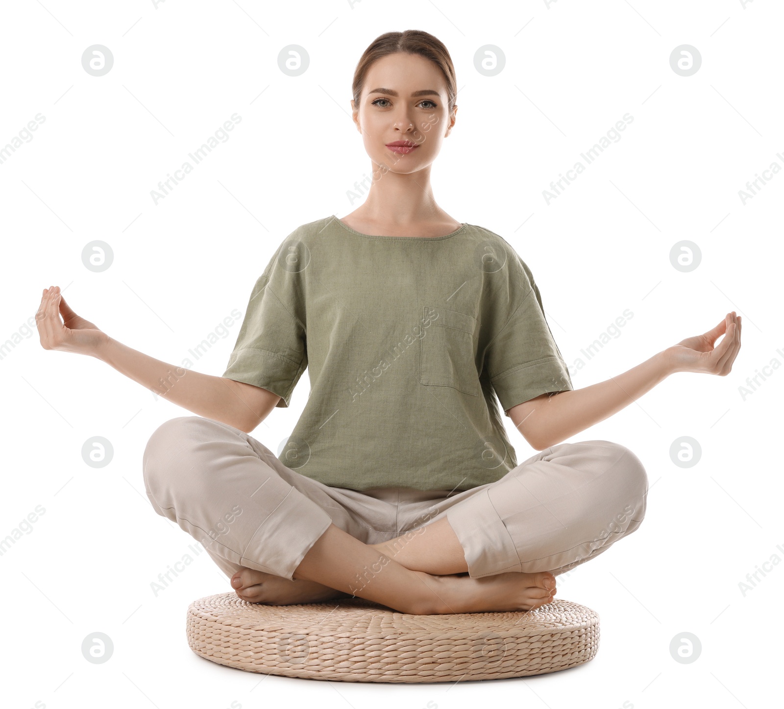 Photo of Beautiful young woman meditating on white background