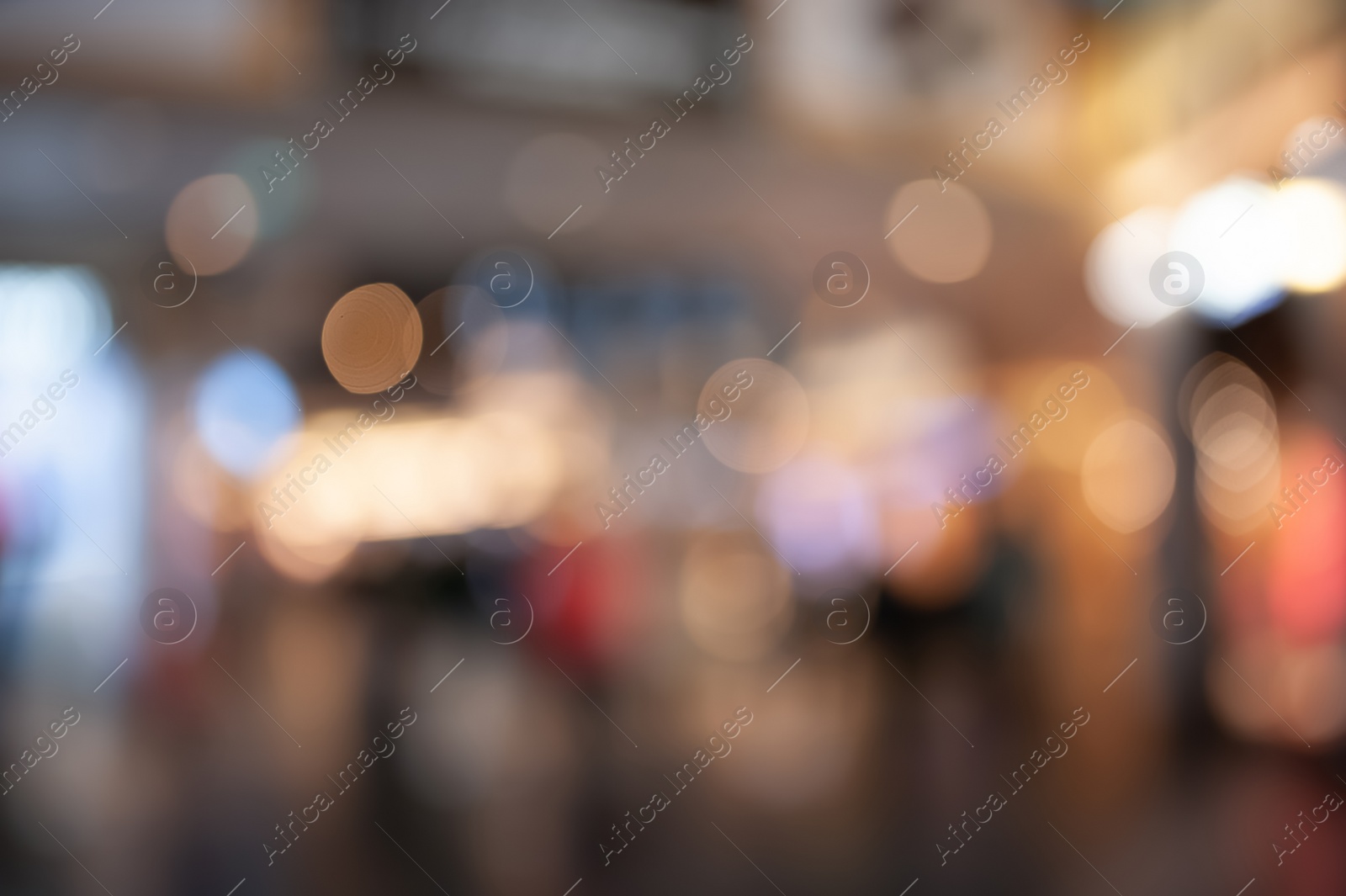 Photo of Blurred view of modern shopping mall interior