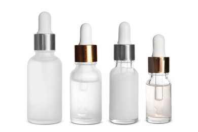 Image of Serums in different bottles isolated on white, collection