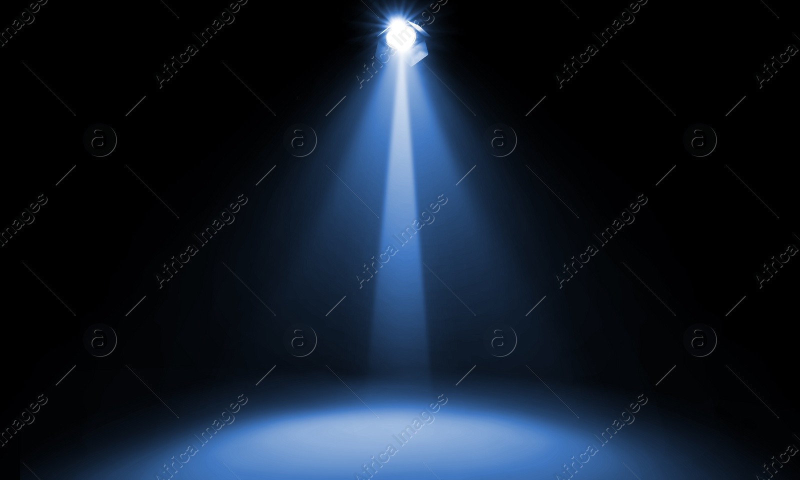 Image of Bright spotlight in darkness. Professional stage equipment